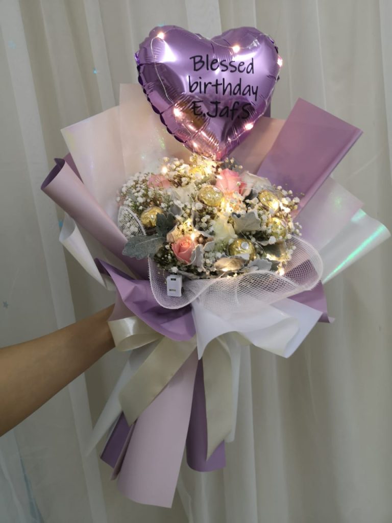 Mag Roses Ferrero Bouquet Nieldelia Online Florist Kl Flower Delivery Kl 